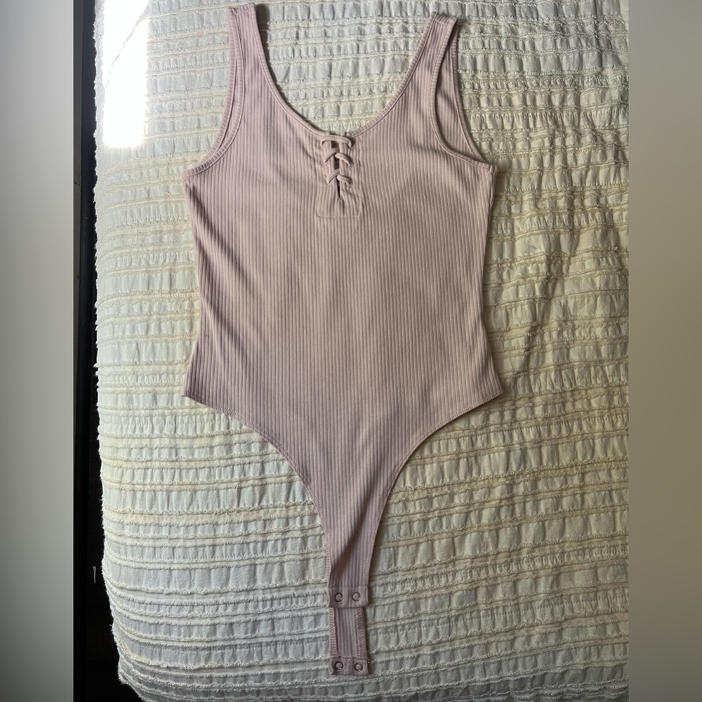 Pink one piece brand double zero sized medium
